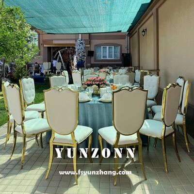 İyi fiyat Yeni Kedi Kafa Paslanmaz Çelik Çerçeve Otel Düğün Sandalyeleri Mobilya Tedarikleri Beyaz Deri Etkinlik Sandalyesi Altın Etkinlikler Parti Banketi çevrimiçi